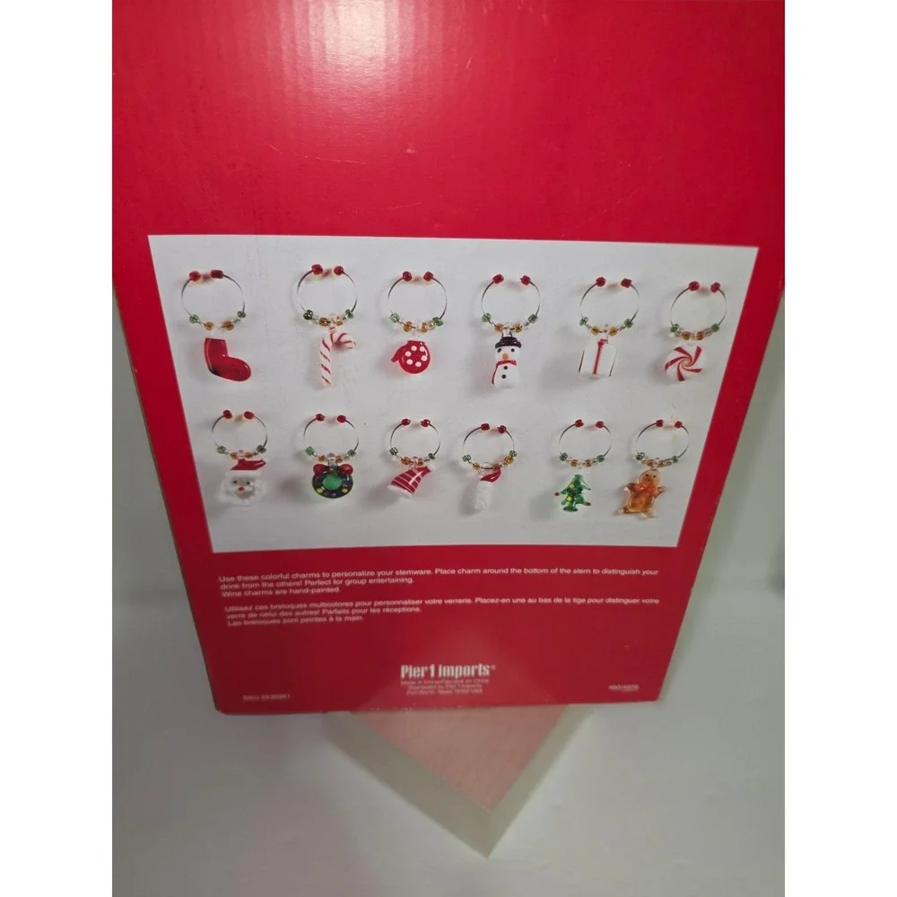 Pier 1 Imports reindeer wine charm‎ set featuring a decorative metal stand